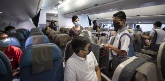 ‘Inside Singapore Airlines’ Takes Flight and Gives Back An SIA flight stewardess guides students from Northlight School on the basics of inflight service in a mockup cabin of an Airbus A380