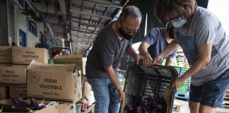 Community Fridges: When Food Waste is Good Enough to Eat Rescuers of produce handle the hard work of collecting fruit and vegetables from Pasir Panjang Wholesale Market.