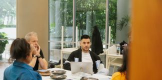 Making indie great again: Why this writer decided to self-fund a black box theatre production The Cast and Crew gather to discuss the play at Rehearsal for Trouble Came.