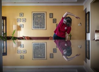 Heart Attack Survivor Kirti Rehabilitates at Home Post-CB Ms Kirti Harnal does warm-up exercises taught by the Heart Wellness Centre.