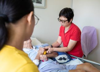 Never Going Solo: Seeking Help with Caregiving Ms Jane Goh is the primary caregiver to her 84-year-old father, a person with Parkinson’s disease (PD) who requires constant monitoring. Jendah (left), the family helper, cares for Mr Goh when Ms Goh is at work.