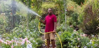 Planting Marsiling’s Own Eden Mr Ganesh Kumar waters the plants he grows at Woodlands Botanical Garden. He hopes the flowers, biodiversity, and garden community will continue to grow and thrive.